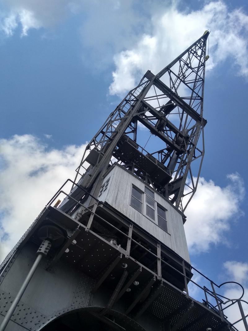 A picture of a blue harbour crane in Antwerp.